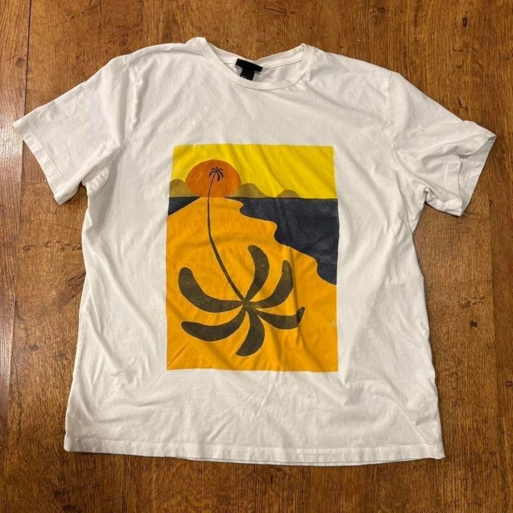 42. white H&M Conscious cotton t-shirt with palm tree desig